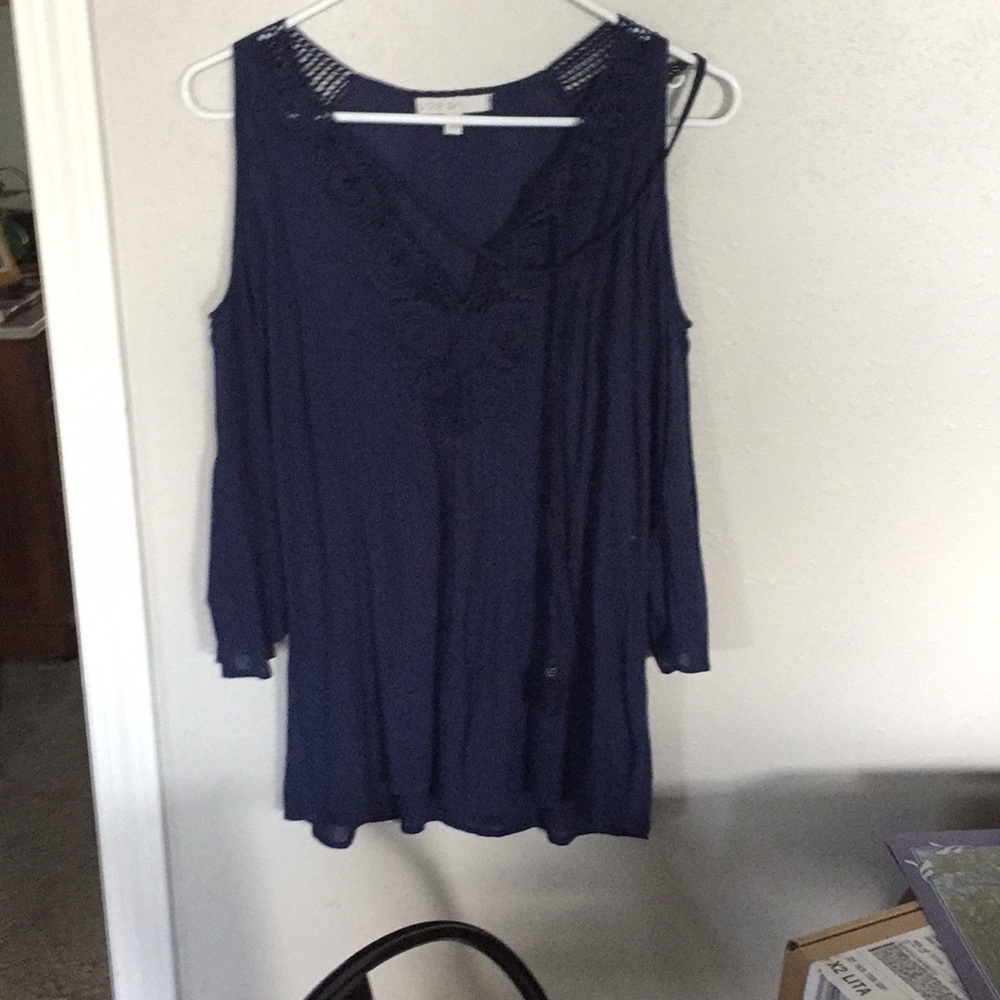 Top with open shoulders